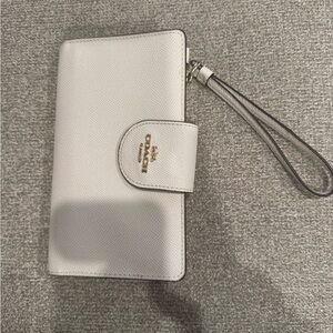 COACH - tech phone wallet. New